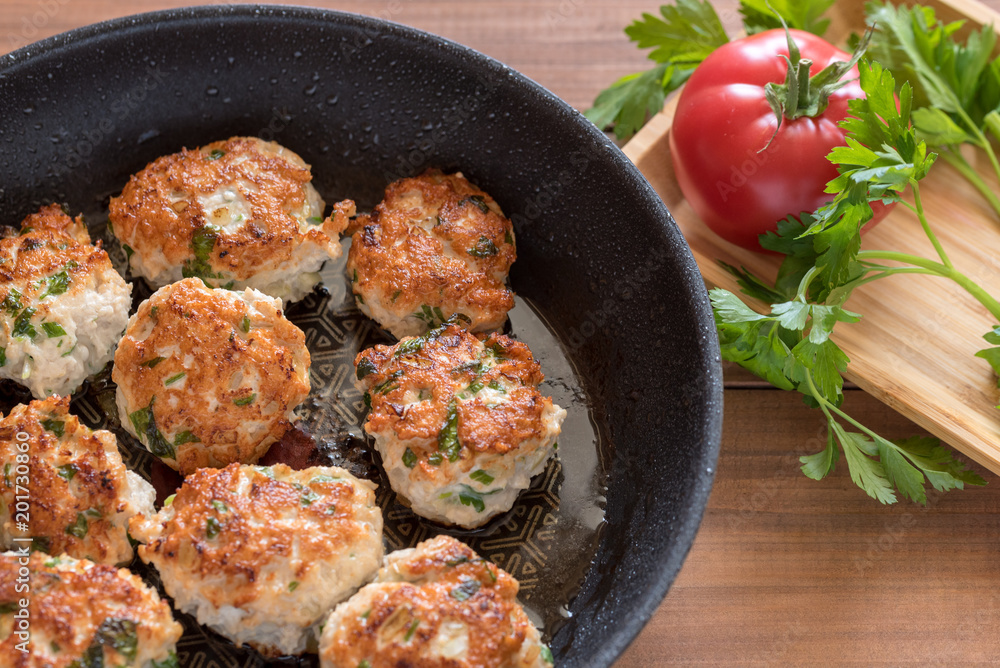 Fried turkey cutlets in a pan. Fried turkey cutlets in a pan.