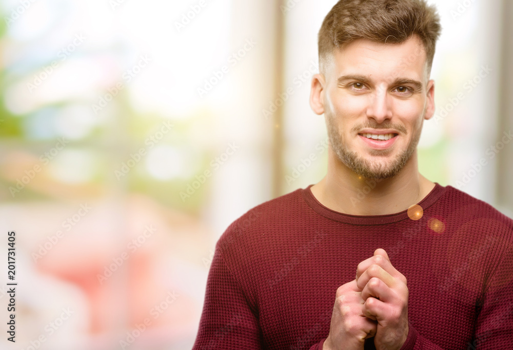 Handsome young man confident and happy with a big natural smile in love Handsome young man confident and happy with a big natural smile in love