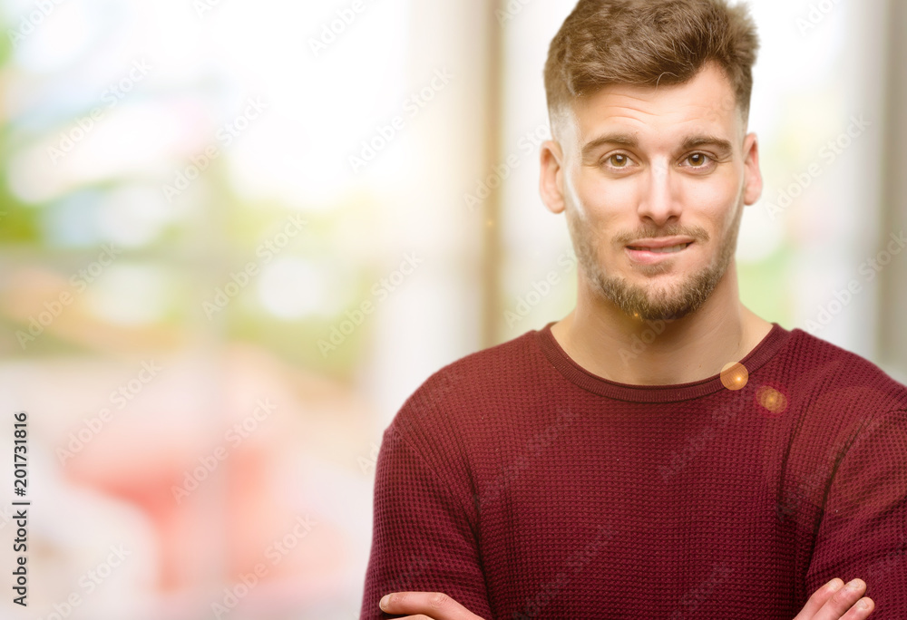 Handsome young man nervous and scared biting lips looking camera with impatient expression, pensive Handsome young man nervous and scared biting lips looking camera with impatient expression, pensive