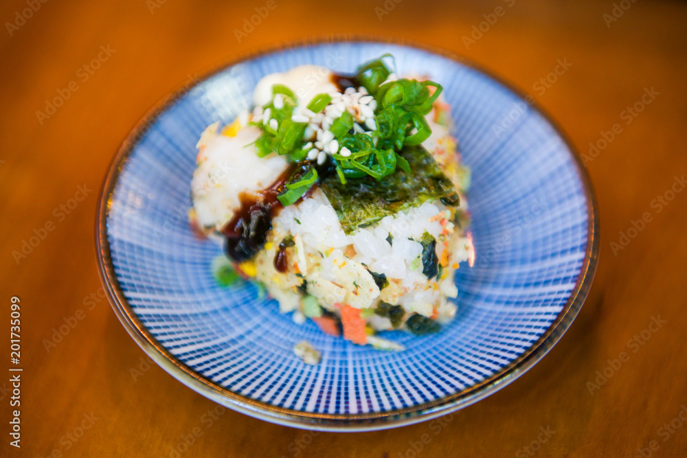 Triangle shaped rice with seaweed sushi Triangle shaped rice with seaweed sushi