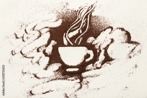 Drawing with ground coffee - cup and smoke, top view