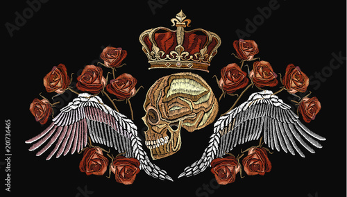Embroidery golden crown, human skull and angel wings. Fashion template for clothes, textiles, t-shirt design. Embroidery medieval dead king with crown and pink roses gothic art
