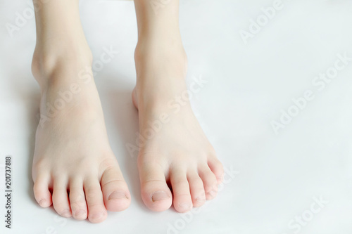 Beautiful legs and feet  of child skin white on white background.Beauty and Health concepts © Photo Sesaon