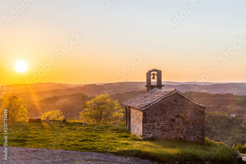 Tableau sur toile Church Sv. Rok against evening sun