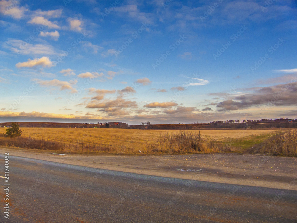 High-speed highway leaving towards the horizon through the flat terrain