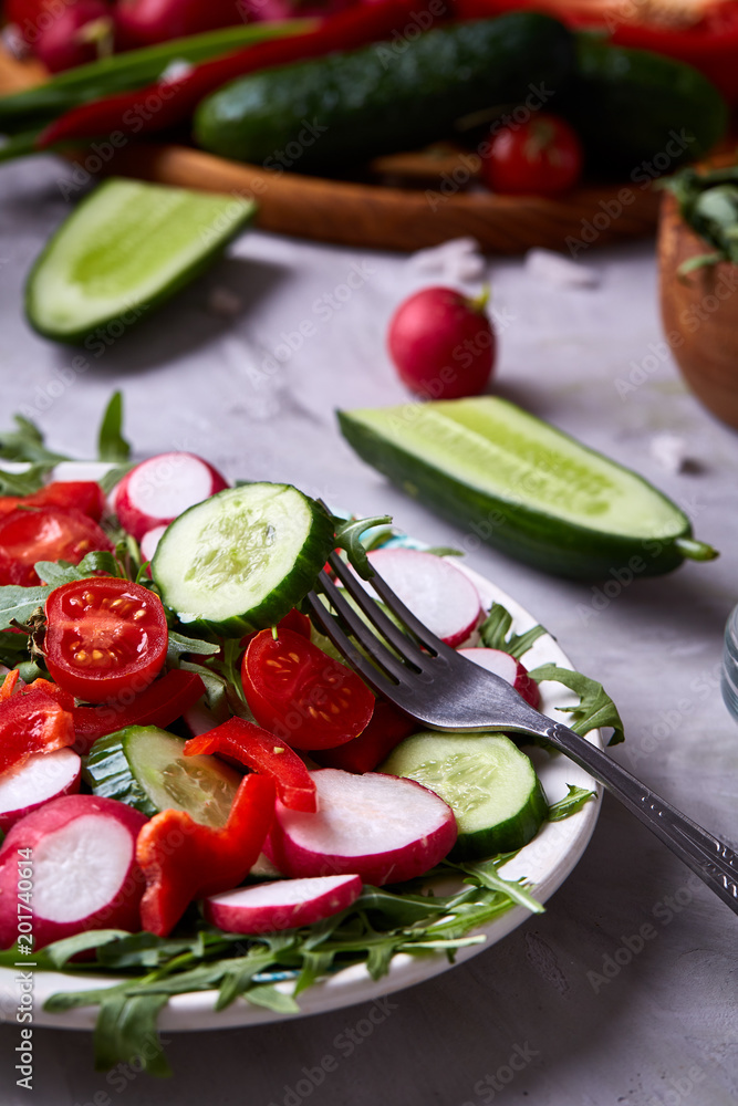 Delicious still life with golden olive oil in glass jar among fresh vegetables, close-up, selective focus Delicious still life with golden olive oil in glass jar among fresh vegetables, close-up, selective focus