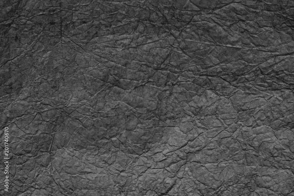 Gray crumpled wrapping paper. Abstract background for design. Gray crumpled wrapping paper. Abstract background for design.