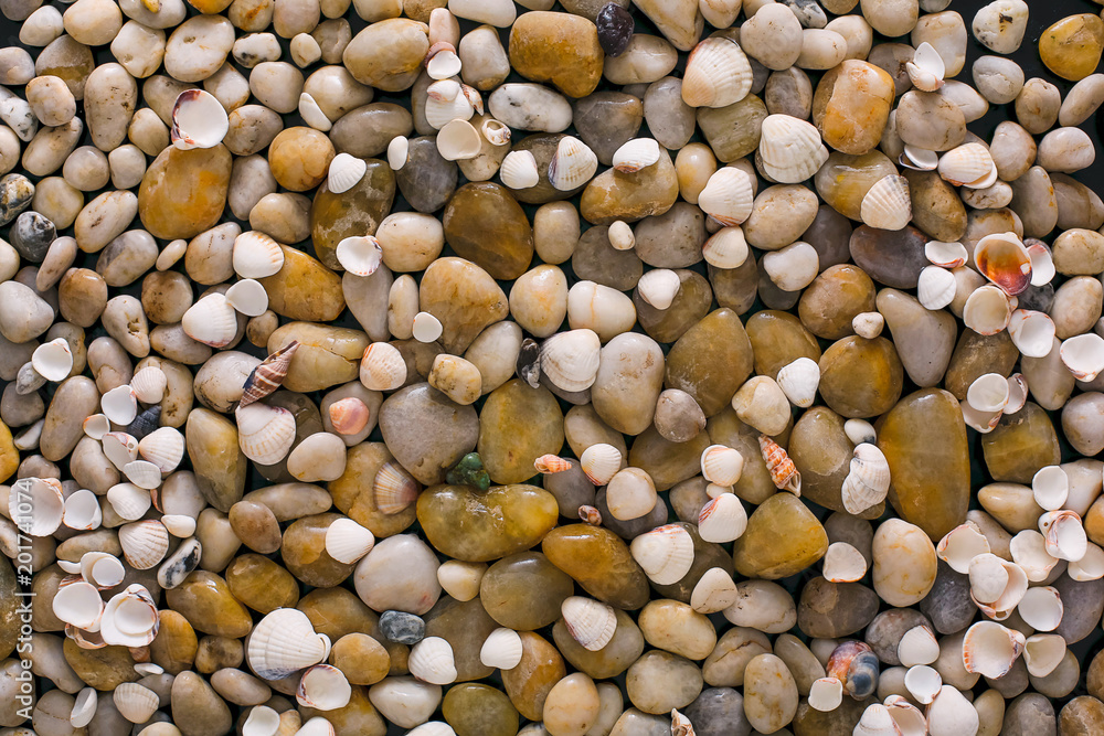 Sea pebbles background, natural seashore stones Sea pebbles background, natural seashore stones