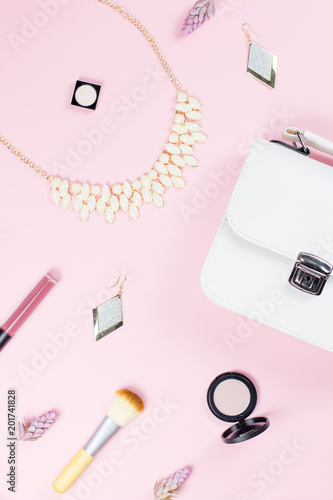 Fashion accessories, makeup products, jewelry and handbag on pastel background. Beauty and fashion concept, flat lay