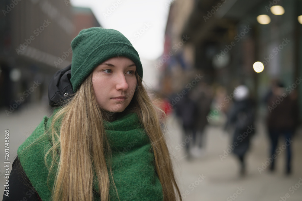 teen girl portrait on pedestrian street on a spring day teen girl portrait on pedestrian street on a spring day
