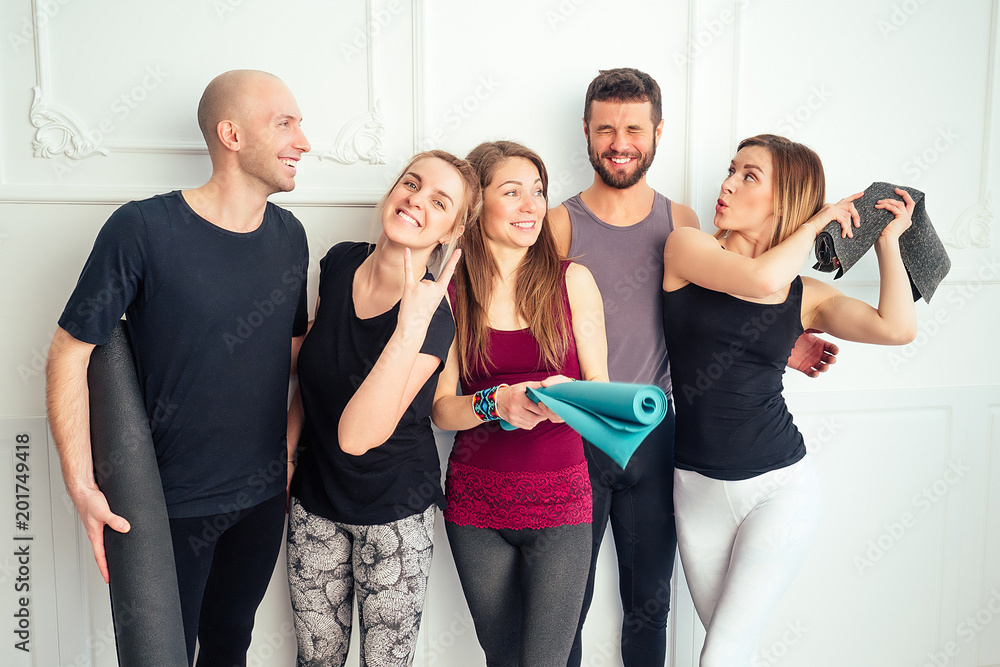 happy group of people from men and women practicing yoga in fun in the studio. groups of meditation and support in the yoga class. yoga, mate, man, woman, many people happy group of people from men and women practicing yoga in fun in the studio. groups of meditation and support in the yoga class. yoga, mate, man, woman, many people