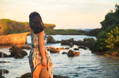 Asian female tourist at Inarajan pool park photo