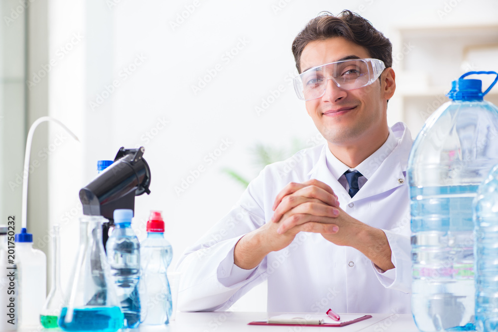 Fototapeta premium Lab assistant testing water quality