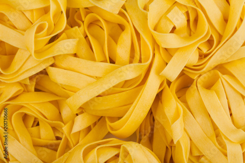 tagliatelle Italian pasta texture background