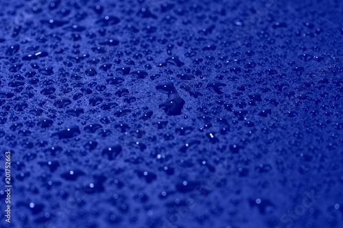 Water drops on blue background. Blue abstract background