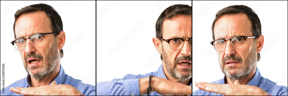 Middle age handsome man closeup serious making a time out gesture with hands Middle age handsome man closeup serious making a time out gesture with hands