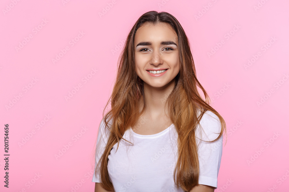 young woman on pink background Attractive beautiful woman showing air kiss young woman on pink background Attractive beautiful woman showing air kiss