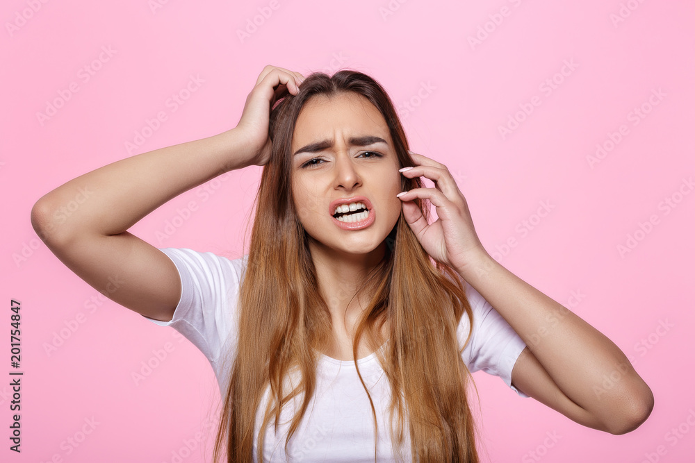 young woman on pink background Attractive beautiful woman showing air kiss young woman on pink background Attractive beautiful woman showing air kiss