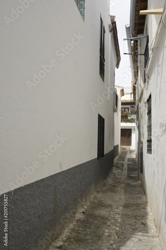 Narrow alley in Albaicin, Granada, Spain