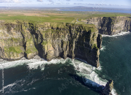 Beautiful Scenic Aerial drone view of Ireland Cliffs Of Moher in County Clare. Sunset over the Cliffs of Moher. Epic Irish rural countryside landscape along the wild atlantic way