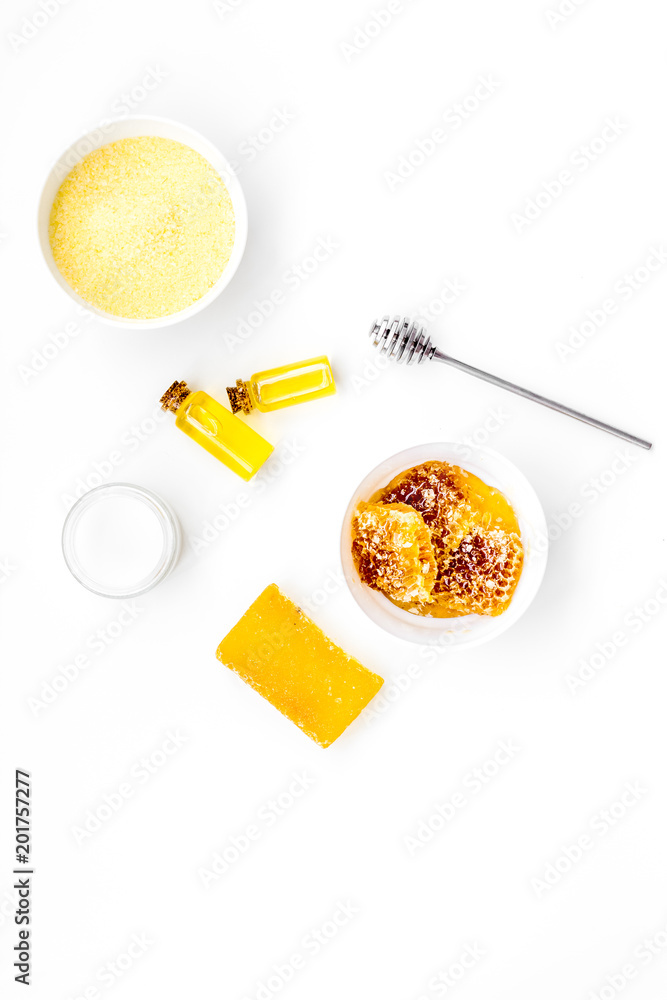 Honey as product for body, face and hair care. Cosmetics with honey. White background top view copy space Honey as product for body, face and hair care. Cosmetics with honey. White background top view copy space