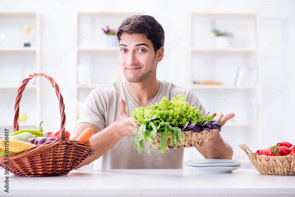 Young man in healthy eating and dieting concept Young man in healthy eating and dieting concept