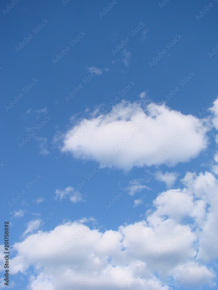 clear blue sky with plain white cloud with space for text background. clear blue sky with plain white cloud with space for text background.