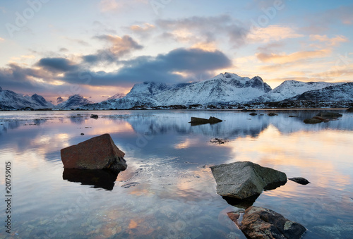 Mountain peak and reflection on the water surface. Natural landscape in the N...