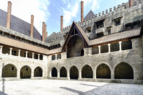 Panoramic view of the main Courtyard of the Palace of the Dukes of Braganza in Guimaraes, in Norman style built in granite stone and magnificently preserved, is the only one of this style in Portigal photo