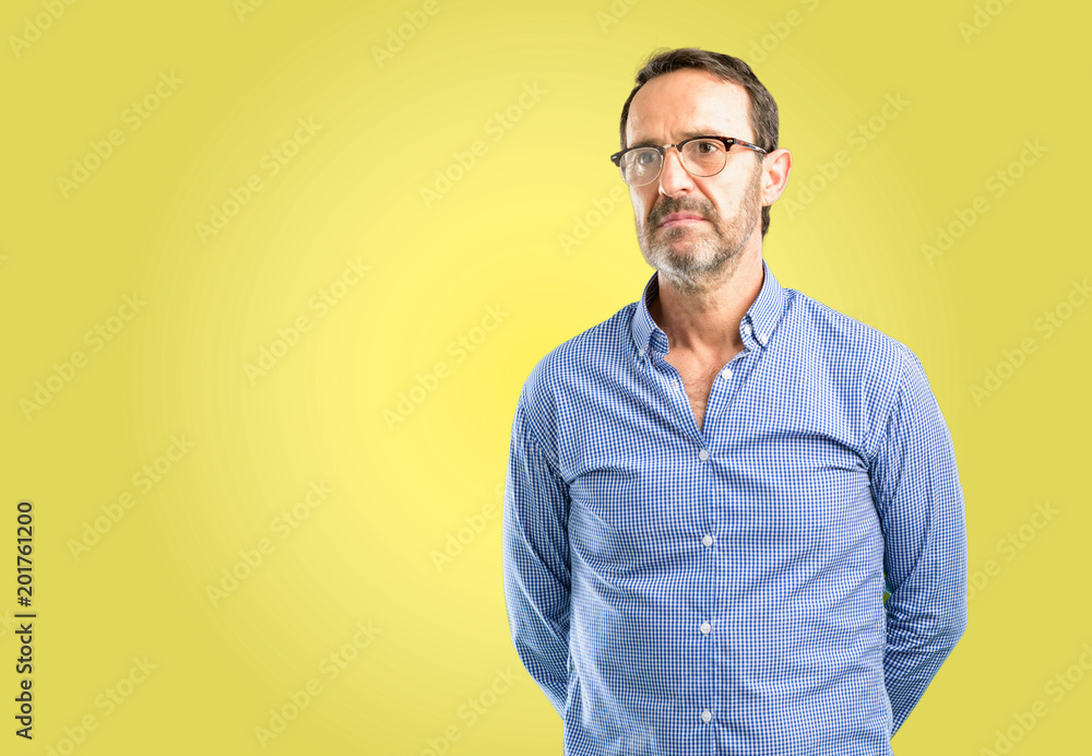Handsome middle age man confident and happy with a big natural smile laughing Handsome middle age man confident and happy with a big natural smile laughing