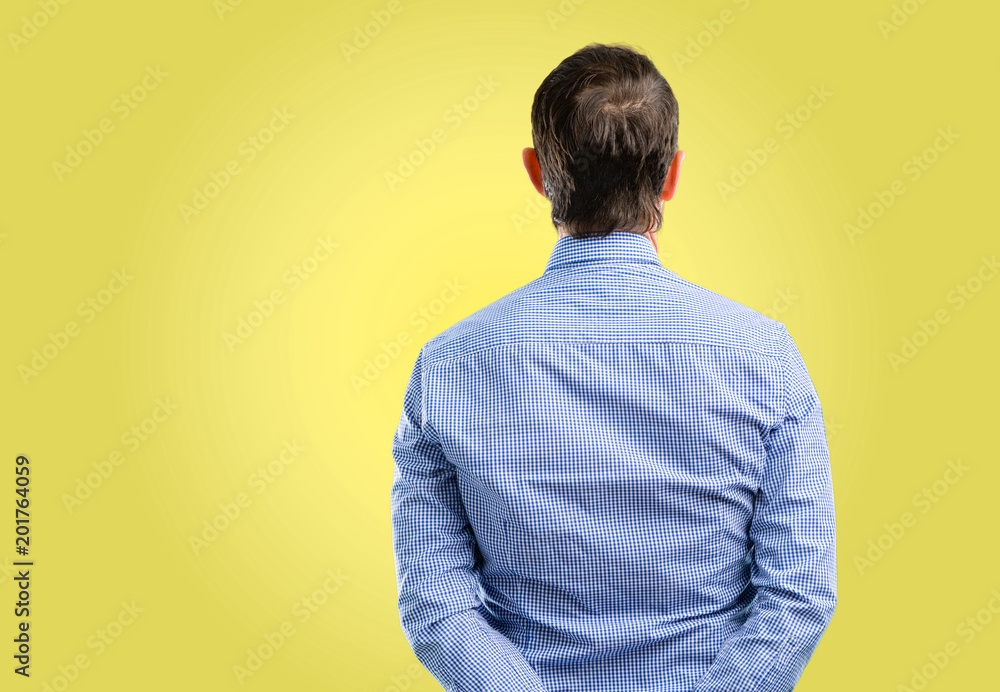 Handsome middle age man backside, rear view Handsome middle age man backside, rear view