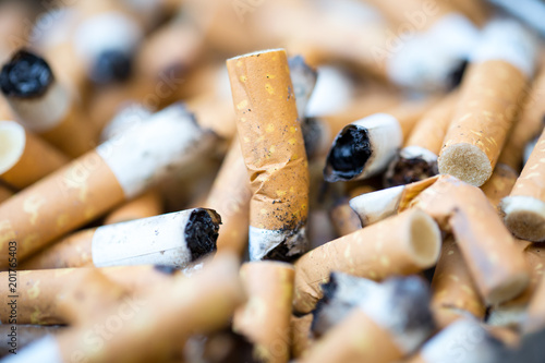 Close up of cigarette butt in the ashtray (macro concept)