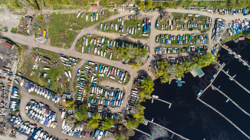 Aerial view of boats on land near the harbor