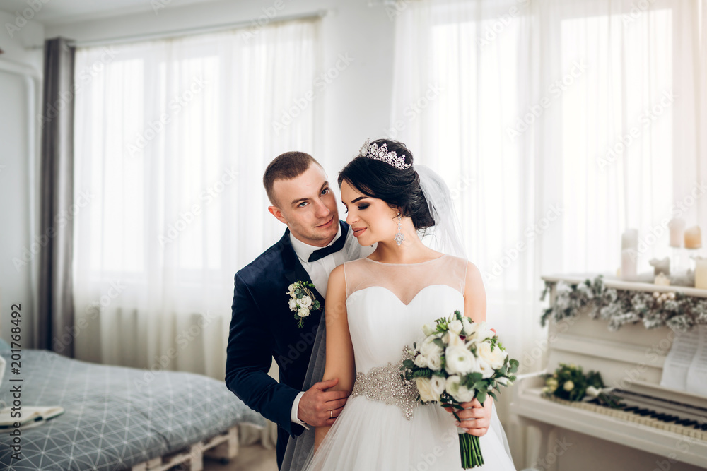 Pretty young wedding couple