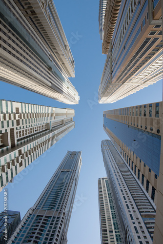 Photography A group of skyscrapers in Dubai seen from below
