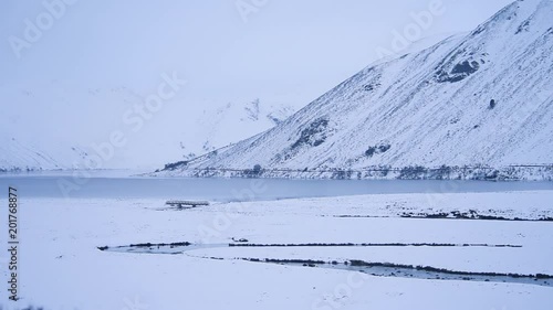 view of loch muick in the scottish highlands at winter time photo