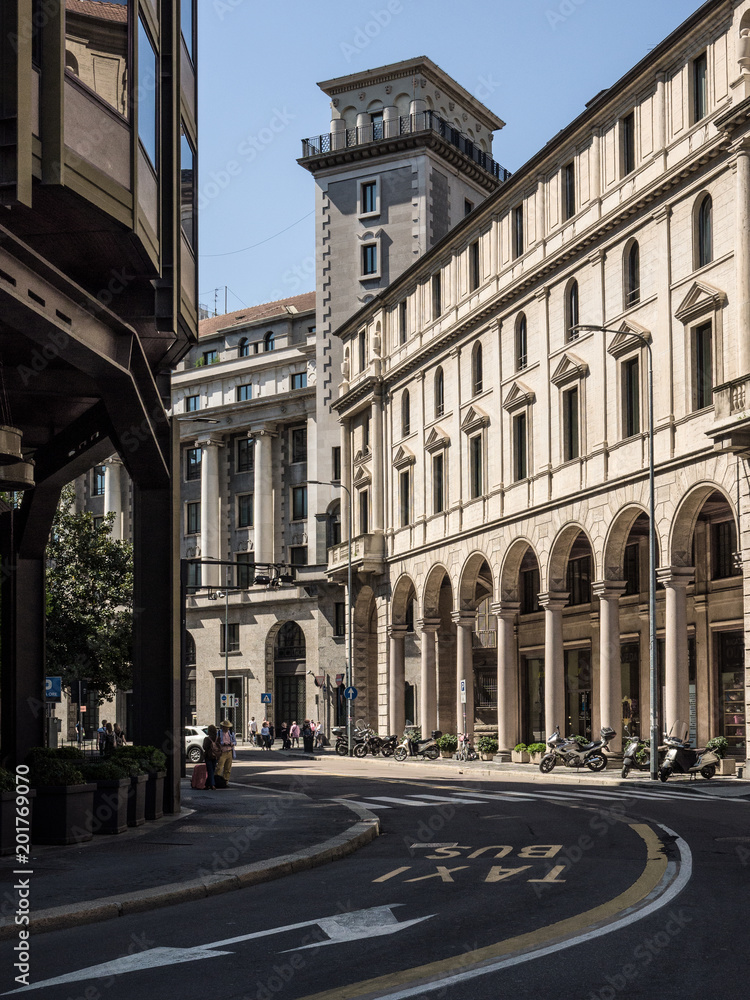 arcades in the elegant buildings of the center of Milan, Italy