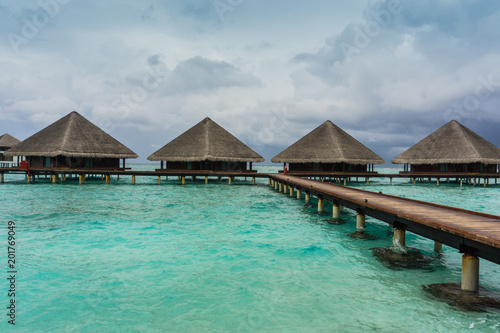Over the water bungalows on exotic island © Catalina