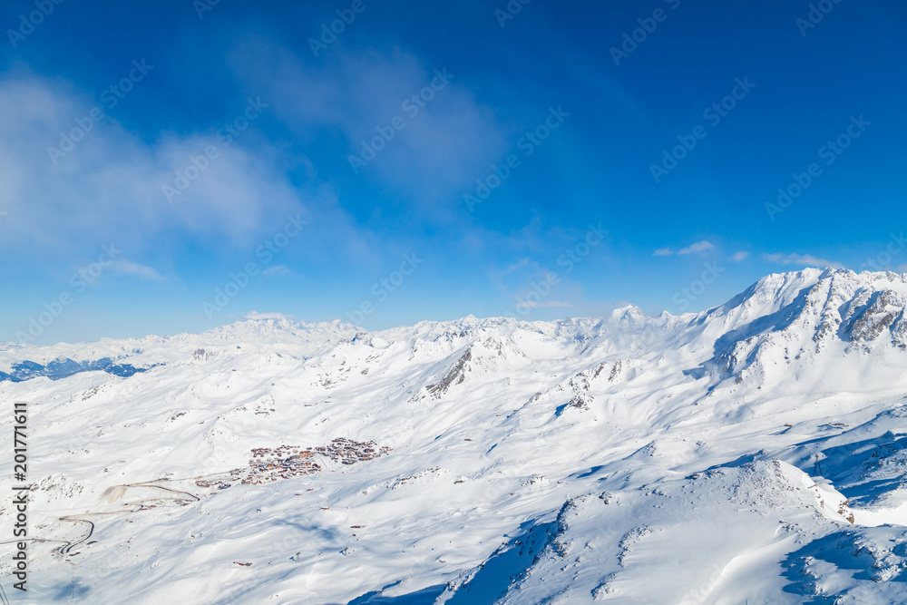 Winter Alps landscape, mountains with clouds, from ski resort Val Thorens. 3 valleys (Les Trois Vallees), France Winter Alps landscape, mountains with clouds, from ski resort Val Thorens. 3 valleys (Les Trois Vallees), France