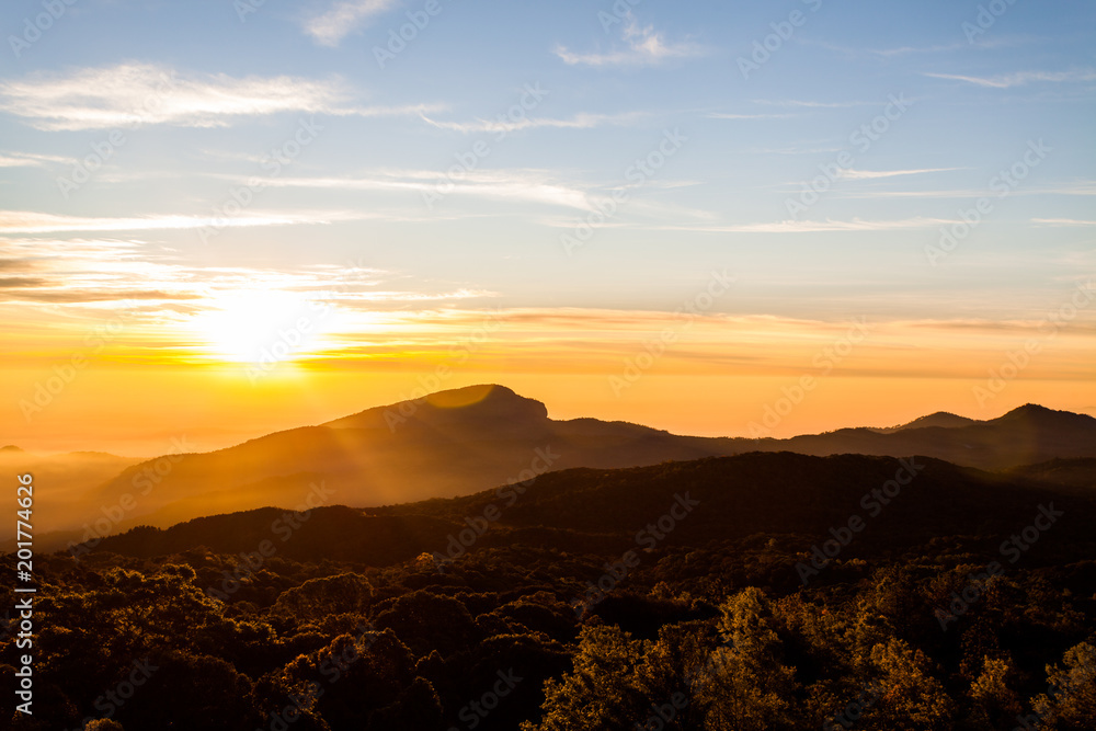 Obraz premium colorful dramatic sky with cloud at sunset.