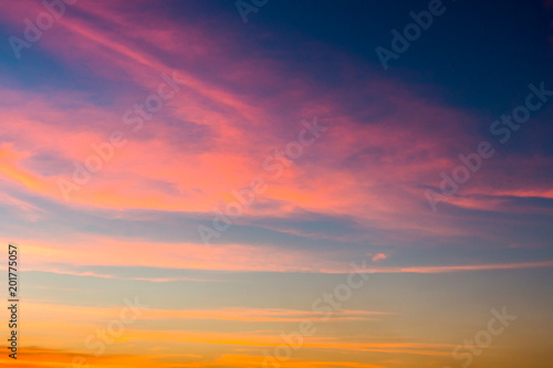 colorful dramatic sky with cloud at sunset.