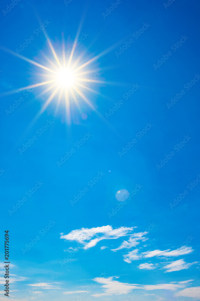 Fototapeta premium Summer background, wonderful blue sky with bright sun