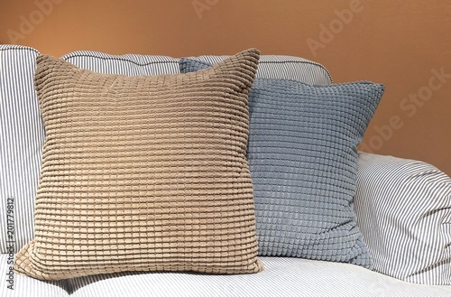 Brown and Gray Decorative Pillow on Comfortable Sofa