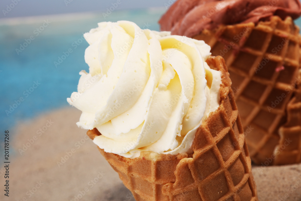 Vanilla frozen yogurt or soft ice cream in waffle cone. Vanilla frozen yogurt or soft ice cream in waffle cone.