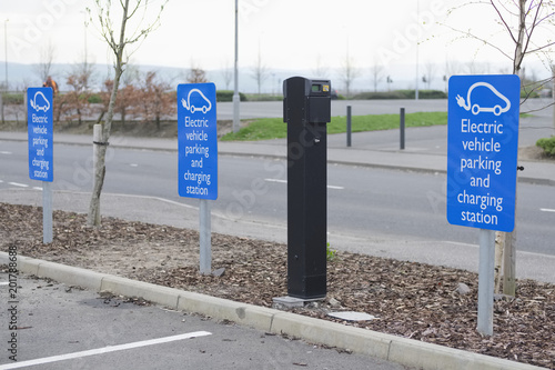 Electric charging point for vehicles cars bikes free no charge operated in shopping mall retail park in car parking space