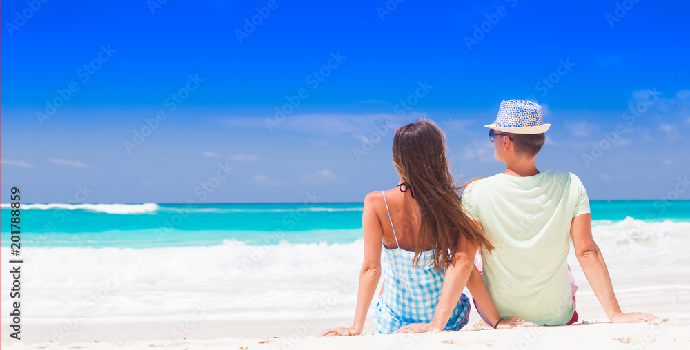 attractive couple enjoying sunny day at Cayo Largo beach, Cuba