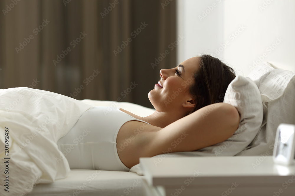Woman relaxing sleeping at home in the night Woman relaxing sleeping at home in the night