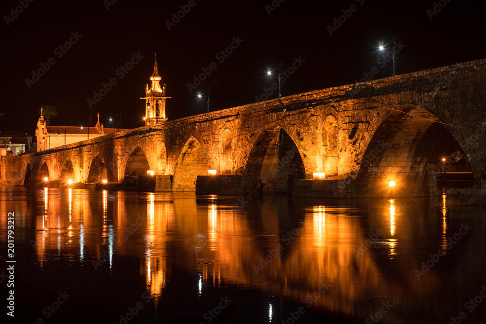 Bridge crossing the Rio Lima at night