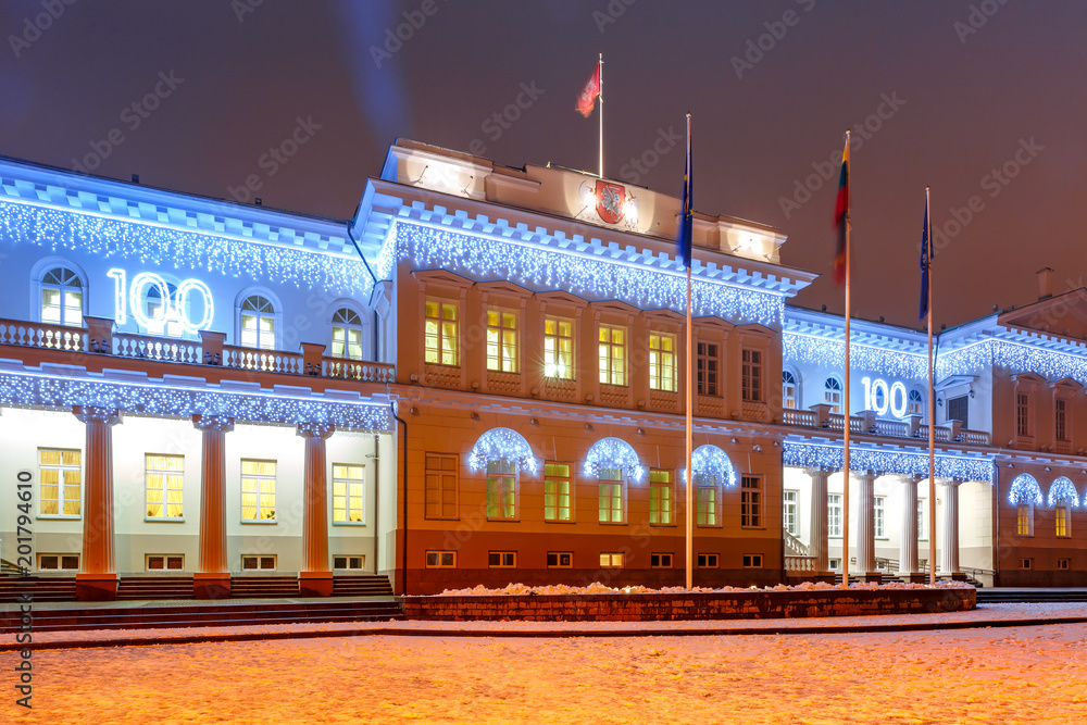Decorated and illuminated facade of Presidential Palace at night of Vilnius, Lithuania, Baltic states.