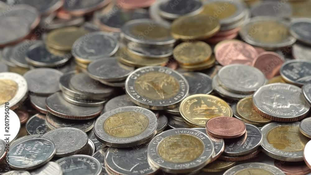 A collection of different coins as a rotating background
A collection of different coins as a rotating background